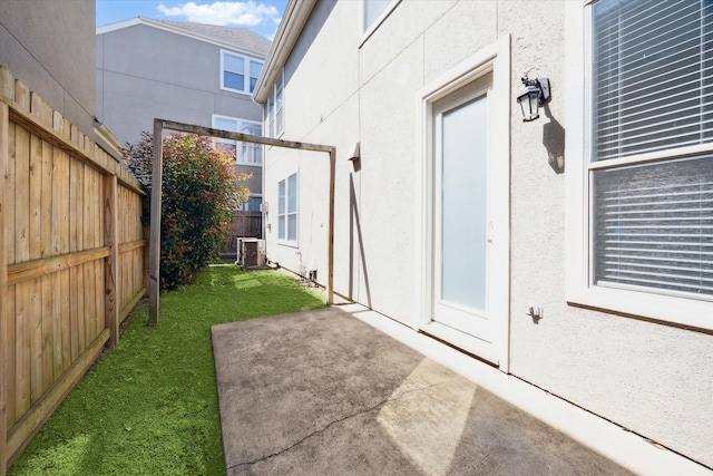 5309 Elm St, Houston, TX 77081 - exterior space featuring a fenced backyard, central air condition unit, and a patio area