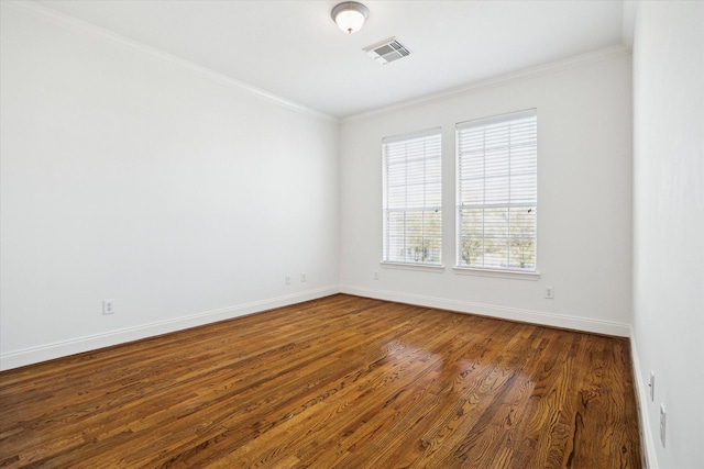 5309 Elm St, Houston, TX 77081 - spare room featuring baseboards, visible vents, crown molding, and wood finished floors