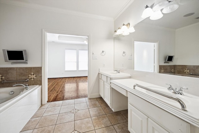 5309 Elm St, Houston, TX 77081 - bathroom featuring tile patterned floors, a bath, crown molding, and vanity