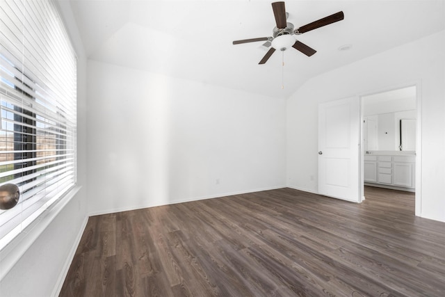 5135 Dunstable Manor Ln, Rosharon, TX 77583 - unfurnished bedroom with dark wood finished floors, vaulted ceiling, baseboards, and ceiling fan
