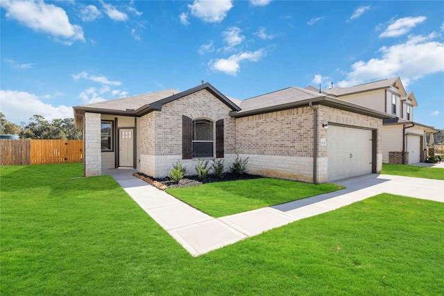 10919 Independence Rd, Cleveland, TX 77328 - view of front of home with concrete driveway, a front lawn, an attached garage, brick siding, and fence