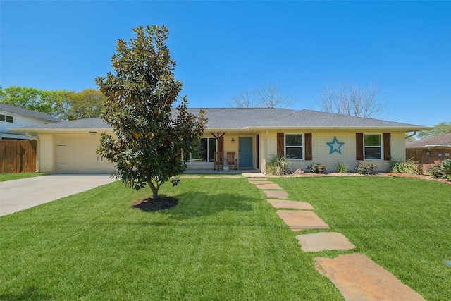 single story home with concrete driveway, fence, a front yard, brick siding, and a garage