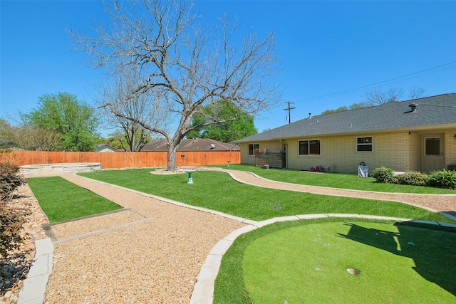 view of yard featuring fence