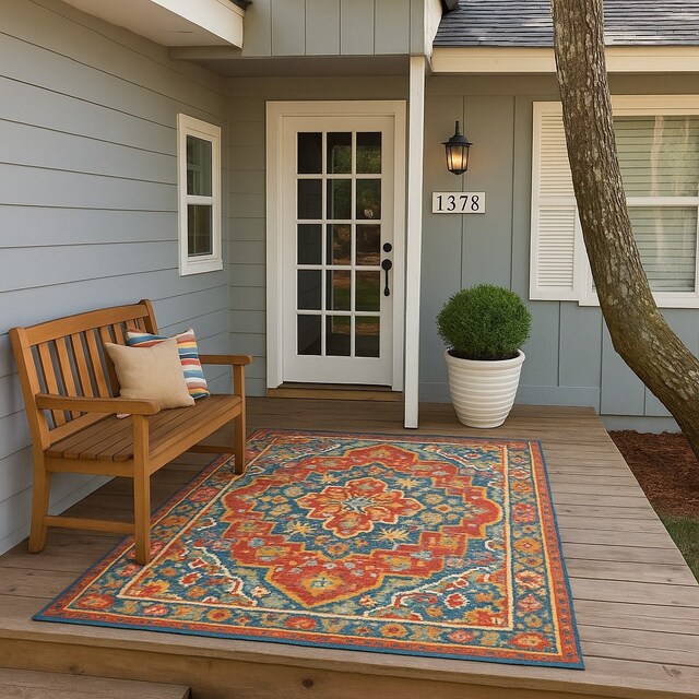1372 Apache Dr, Montgomery, TX 77316 - property entrance with board and batten siding and a porch