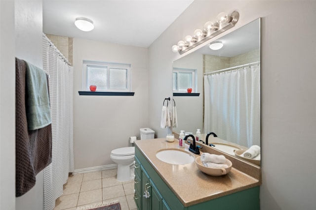 bathroom featuring curtained shower, toilet, tile patterned floors, and vanity