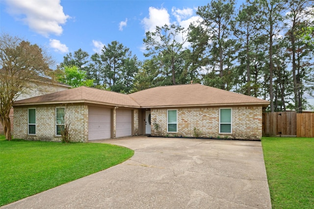 ranch-style house with brick siding, driveway, fence, and a front lawn