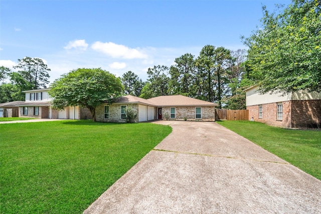 25111 Tuckahoe Ln, Spring, TX 77373 - view of front facade featuring concrete driveway, a garage, and brick siding