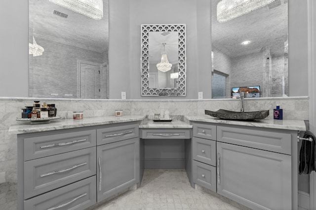34 New Oak Trl, Humble, TX 77346 - full bathroom with tile walls, vanity, a shower, wainscoting, and marble look tile flooring