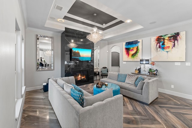 34 New Oak Trl, Humble, TX 77346 - living area featuring ornamental molding, baseboards, arched walkways, a premium fireplace, and a raised ceiling