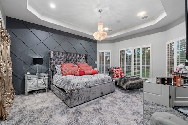 34 New Oak Trl, Humble, TX 77346 - bedroom featuring a decorative wall, a tray ceiling, an accent wall, and recessed lighting