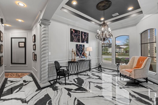 34 New Oak Trl, Humble, TX 77346 - living area with decorative columns, light marble finish flooring, crown molding, a chandelier, and baseboards
