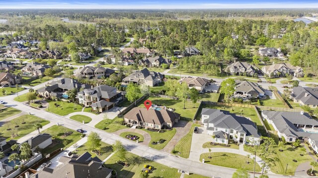 34 New Oak Trl, Humble, TX 77346 - aerial view of property's location with nearby suburban area and a heavily wooded area