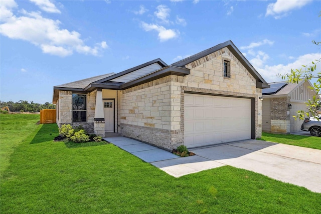 view of front facade featuring driveway, a garage, a front lawn, and stone siding
