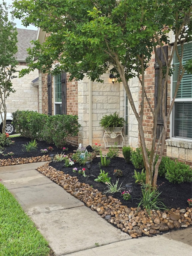 4321 Juniper Ln, Deer Park, TX 77536 - view of property exterior with brick siding and a shingled roof