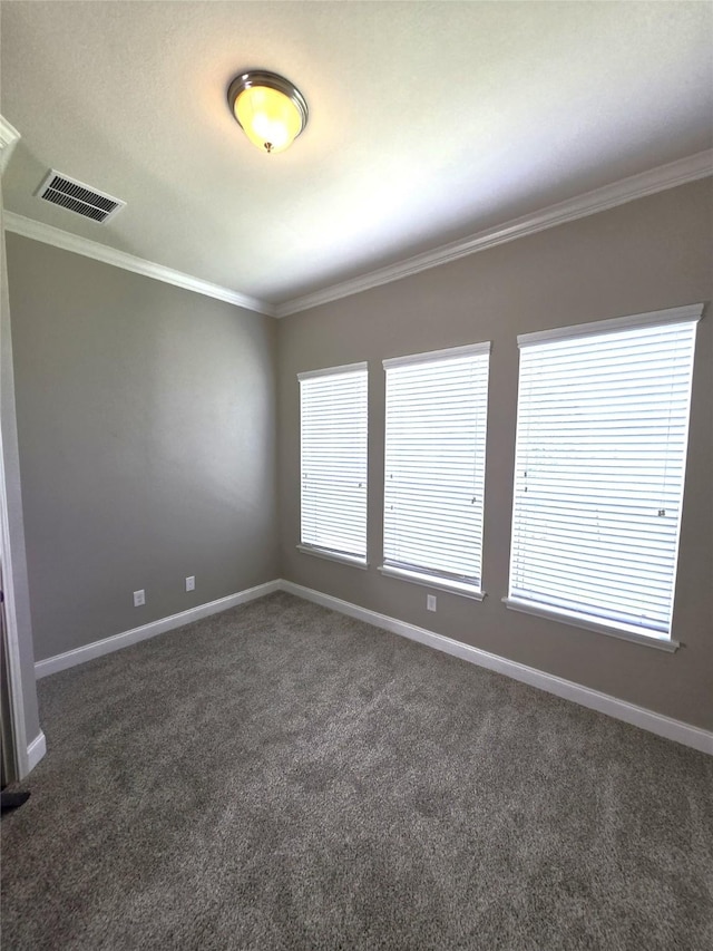 4321 Juniper Ln, Deer Park, TX 77536 - empty room with dark colored carpet, baseboards, crown molding, and healthy amount of natural light