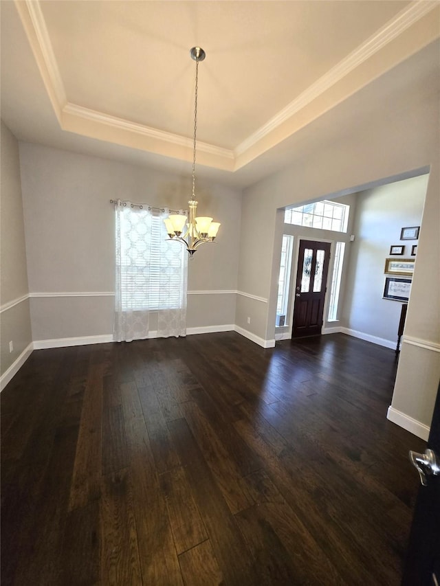 4321 Juniper Ln, Deer Park, TX 77536 - foyer with a tray ceiling, a chandelier, dark wood finished floors, ornamental molding, and baseboards