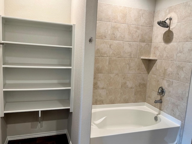 bathroom with shower / bathing tub combination