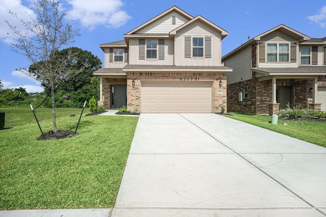 4334 W Bayou Maison Cir, Dickinson, TX 77539 - view of front of house with concrete driveway, an attached garage, a front lawn, brick siding, and board and batten siding