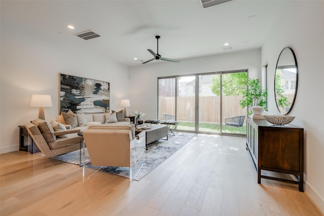 2113 Huldy St, Houston, TX 77019 - living room featuring light wood-type flooring, a ceiling fan, recessed lighting, and baseboards