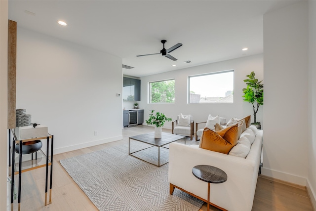 2113 Huldy St, Houston, TX 77019 - living area featuring a ceiling fan, wood finished floors, baseboards, and recessed lighting