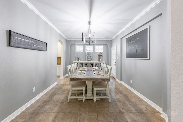 6522 Tamarind Sky Ln, Fulshear, TX 77441 - dining space with arched walkways, ornamental molding, and a chandelier