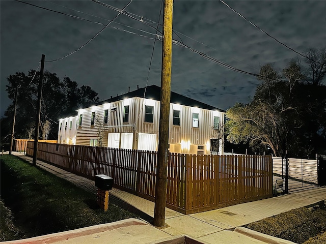 5304 Lynnfield St, Houston, TX 77028 - property exterior at twilight with a fenced front yard