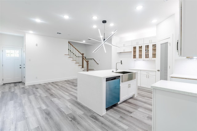 5304 Lynnfield St, Houston, TX 77028 - kitchen with dishwasher, light wood-style flooring, white cabinetry, recessed lighting, and a sink