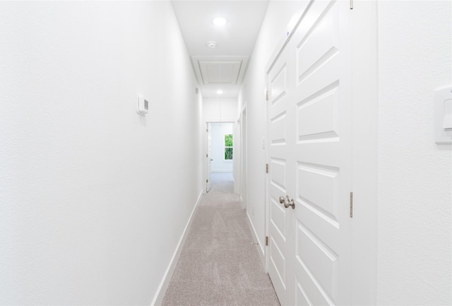 5304 Lynnfield St, Houston, TX 77028 - hall featuring attic access, light carpet, and baseboards