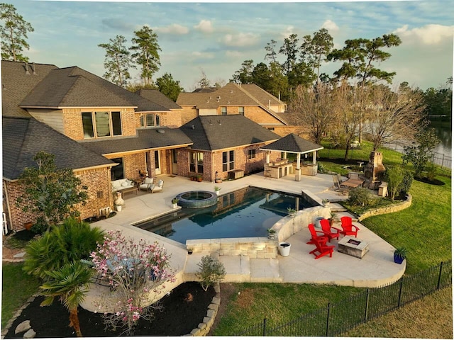 46 Cove View Trail Ct, The Woodlands, TX 77389 - view of pool with a fire pit, a gazebo, a patio area, and a fenced backyard