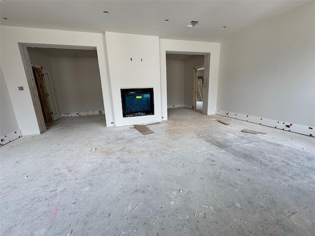 2217 Pelham Dr, Houston, TX 77019 - unfurnished living room featuring a glass covered fireplace