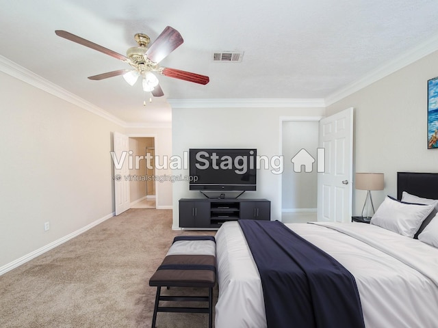 carpeted bedroom featuring visible vents, a ceiling fan, baseboards, and ornamental molding