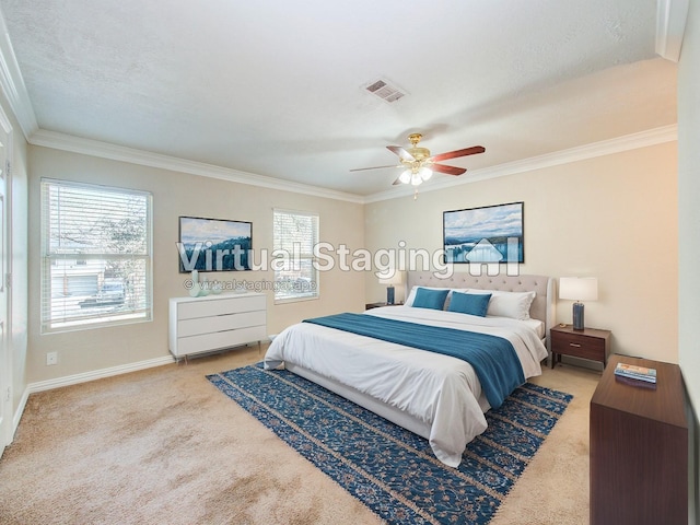 bedroom featuring visible vents, carpet floors, and crown molding