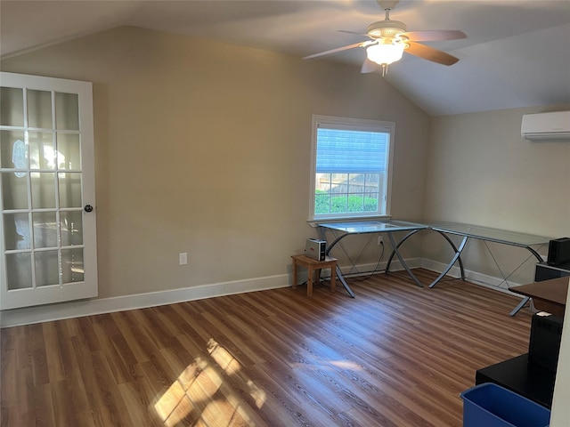 702 Morton St, Richmond, TX 77469 - interior space featuring a ceiling fan, an AC wall unit, vaulted ceiling, and wood finished floors