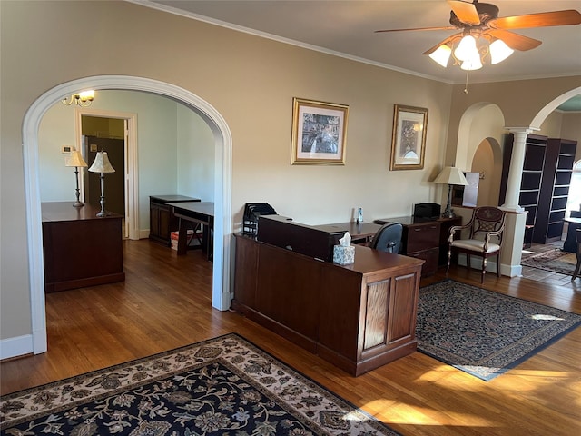 702 Morton St, Richmond, TX 77469 - office area with wood finished floors, arched walkways, crown molding, and ornate columns