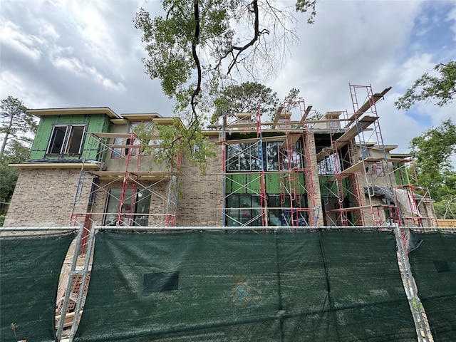 11411 Dunbeath Dr, Houston, TX 77024 - rear view of property featuring brick siding