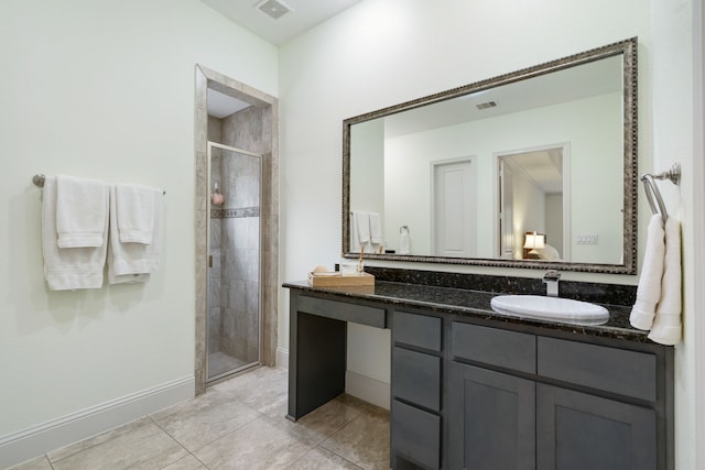 114 Pacific Grove Dr, Montgomery, TX 77316 - full bathroom featuring a sink, tile patterned floors, a stall shower, and visible vents