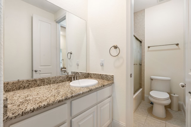 114 Pacific Grove Dr, Montgomery, TX 77316 - full bathroom with toilet, washtub / shower combination, tile patterned flooring, and vanity