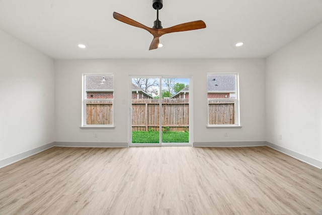 1009 Genova St, Houston, TX 77009 - spare room featuring wood finished floors, baseboards, ceiling fan, and recessed lighting
