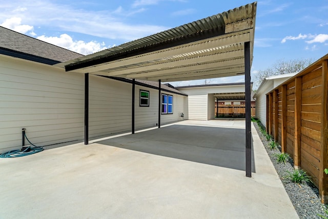 1009 Genova St, Houston, TX 77009 - view of parking / parking lot with an attached carport