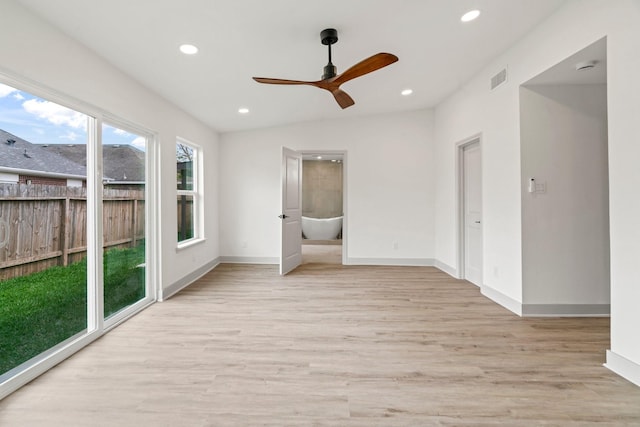 1009 Genova St, Houston, TX 77009 - unfurnished room featuring recessed lighting, light wood-type flooring, ceiling fan, and baseboards