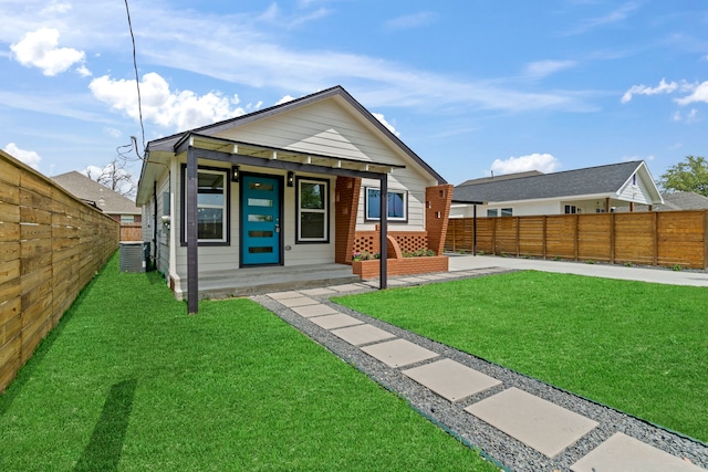 1009 Genova St, Houston, TX 77009 - back of property with central AC unit and covered porch