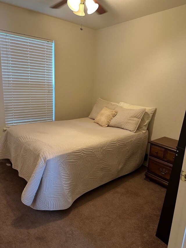 833 E Camp St, La Grange, TX 78945 - bedroom with carpet and ceiling fan