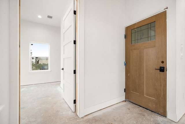 view of exterior entry with visible vents