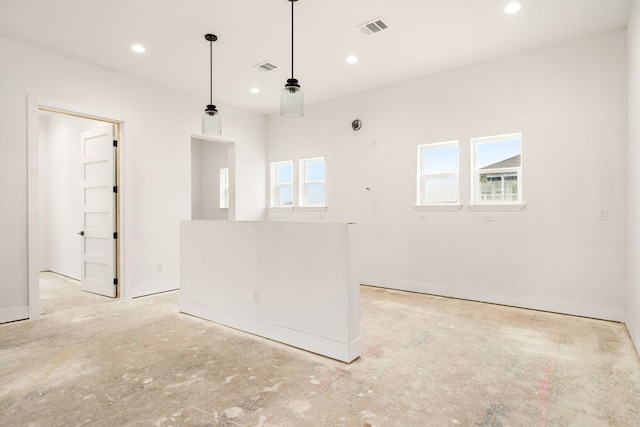 empty room with recessed lighting, baseboards, and visible vents
