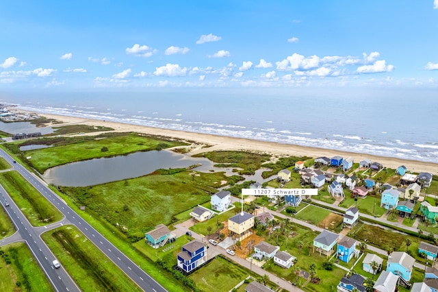 birds eye view of property featuring a residential view and a water view