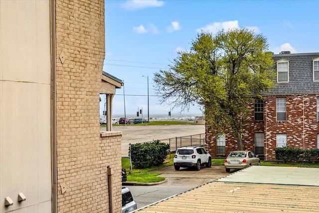 215 Postoffice St Unit 1004, Galveston, TX 77550 - exterior space with fence