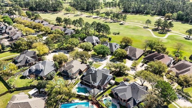 bird's eye view featuring golf course view and a residential view