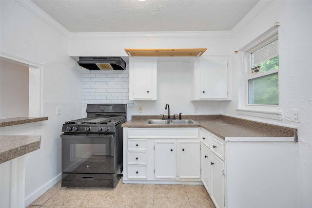 10522 Fairland Dr, Houston, TX 77051 - kitchen featuring white cabinetry, ornamental molding, under cabinet range hood, a sink, and black gas range oven