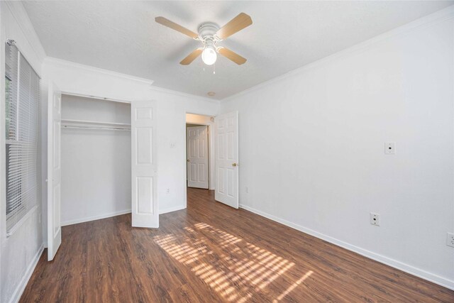 10522 Fairland Dr, Houston, TX 77051 - unfurnished bedroom with dark wood finished floors, baseboards, a closet, and ornamental molding