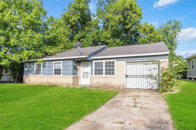 10522 Fairland Dr, Houston, TX 77051 - single story home featuring an attached garage, driveway, a front yard, a gate, and brick siding